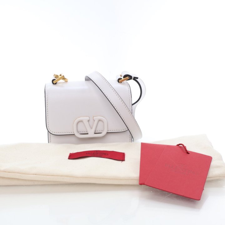 【関税&送料込み】Valentino Garavani White Leather Vsling Valentino VSling Micro - Luxe Du Jour
