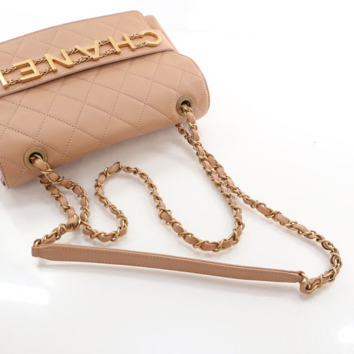 Chanel Logo Enchanted Flap Bag Medium Beige Calfskin - Luxe Du Jour