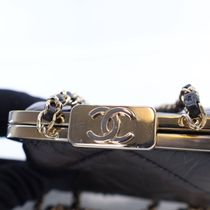 Chanel Black Lambskin Kiss Lock Clutch With Chain - Luxe Du Jour